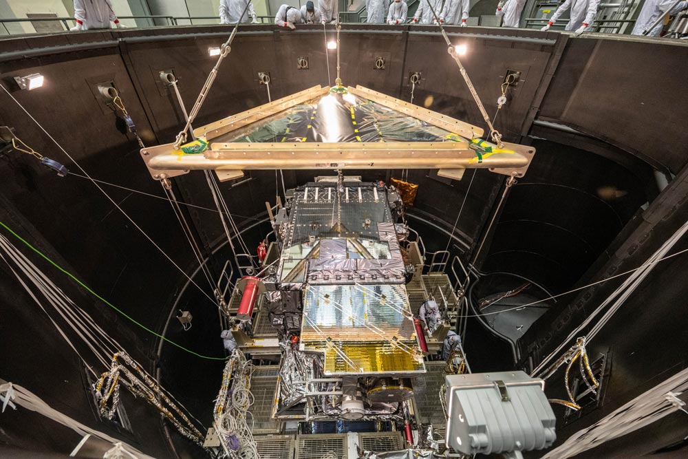 GOES-T is lowered into the thermal vacuum chamber