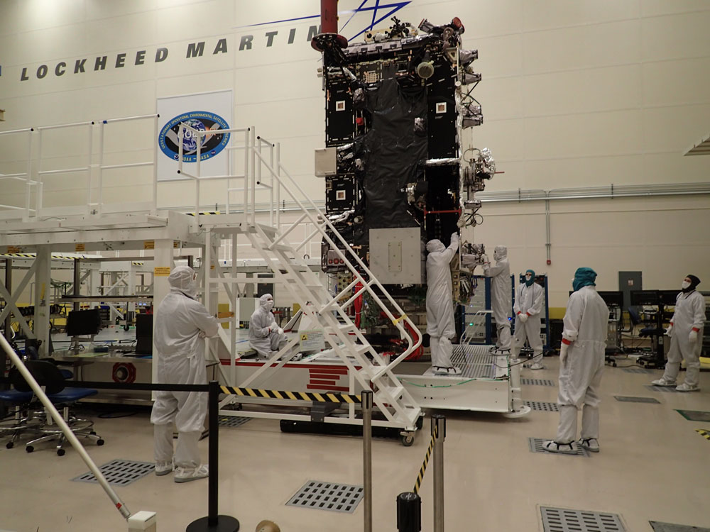 Technicians work on GOES-T in a clean room at Lockheed Martin in Littleton, Colorado. Credit: Lockheed Martin