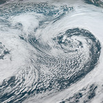 View HIGHEST REZ Version in new window. GOES West Sees Cyclone and Cloud Streets Over the Gulf of Alaska
